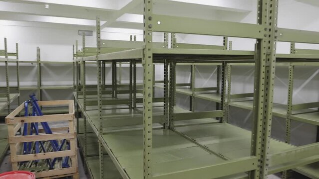 Empty Green Shelving System Storage Room Warehouse pan