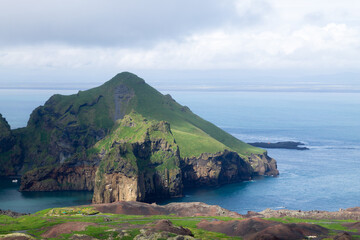 Vestmannaeyjar island beach day view, Iceland landscape.