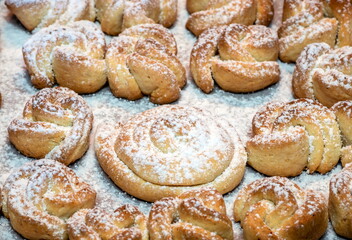 Sweet homemade cakes sprinkled with vanilla sugar. Small cookies