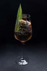 the bartender prepares a delicious alcoholic cocktail	