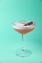 the bartender prepares a delicious alcoholic cocktail	