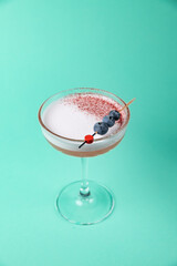 the bartender prepares a delicious alcoholic cocktail	