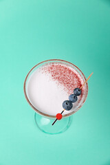 the bartender prepares a delicious alcoholic cocktail	