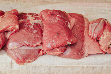 Fresh meat on display in a traditional market