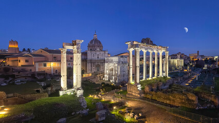 Fototapeta na wymiar Roman Forum by night with moon - Rome