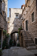 Fototapeta na wymiar Morning on narrow street of Mediterranean town.