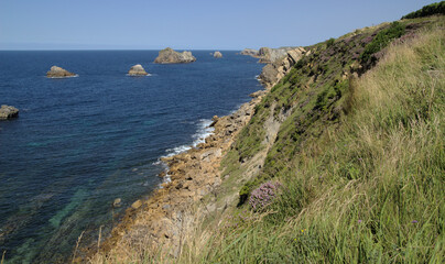 Fototapeta na wymiar Coastal part of Cantabria in the north of Spain, eroded Costa Quebrada, ie the Broken Coast