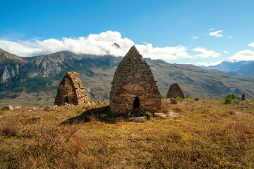 Old stone tomb, a crypt on the top of a mountain. Ossetia region.