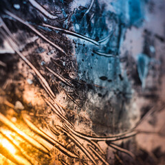 Abstract warm image for a background with aluminum stains at sunset, abstraction for the background