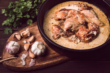 Shkmeruli, fried chicken, in milk-garlic sauce, Georgian cuisine, homemade, close-up, no people,