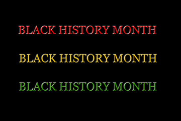 closeup the bunch red,yellow,green, black history month on the black background.