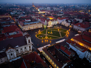 Fototapeta na wymiar The Unirii Square from Timisoara at the blue hour with view of the city, Timisoara the European Capital of Culture in 2023