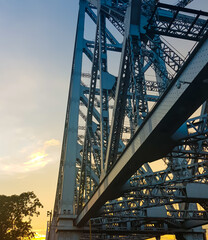 Structure of the famous Howrah Bridge in the evening in Kolkata, India