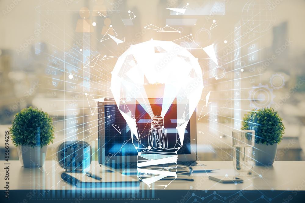 Poster Computer on desktop in office with bulb icon hologram. Double exposure. Concept of idea.