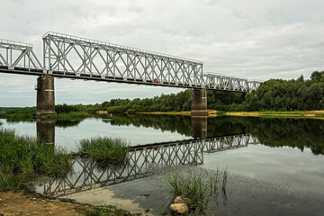 Several sections of the railway bridge are laid over the river bed