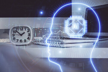 Double exposure of table with computer and brain hologram. Data innovation concept.