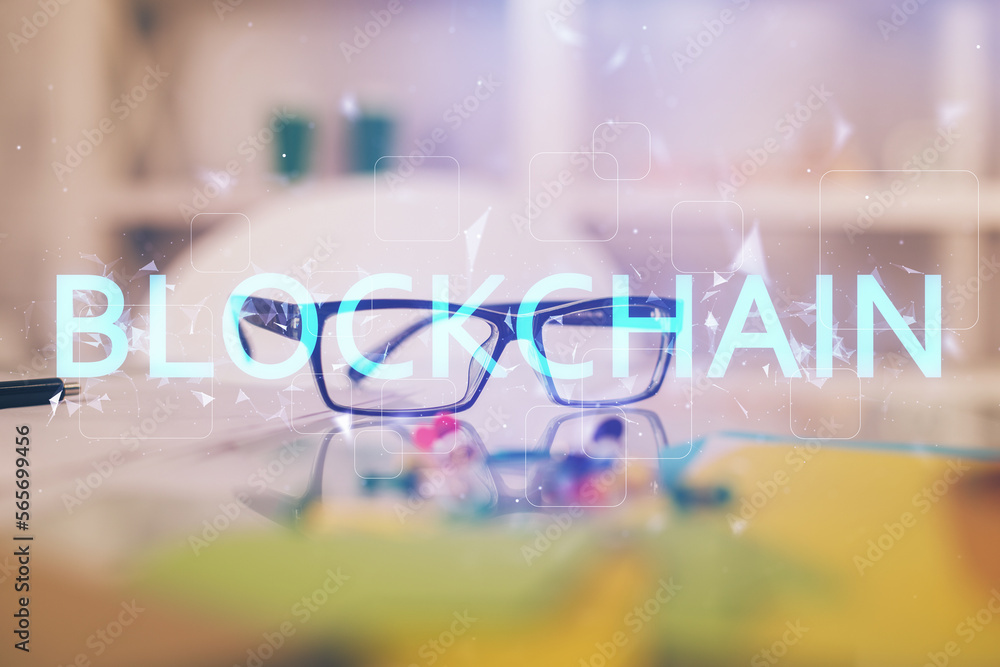 Poster crypto theme hologram with glasses on the table background. concept of blockchain. double exposure.
