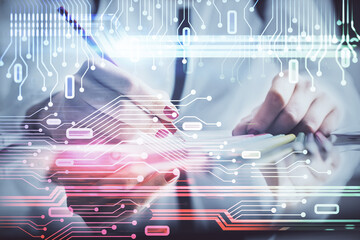 Multi exposure of woman's writing hand on background with data technology hud. Big data concept.