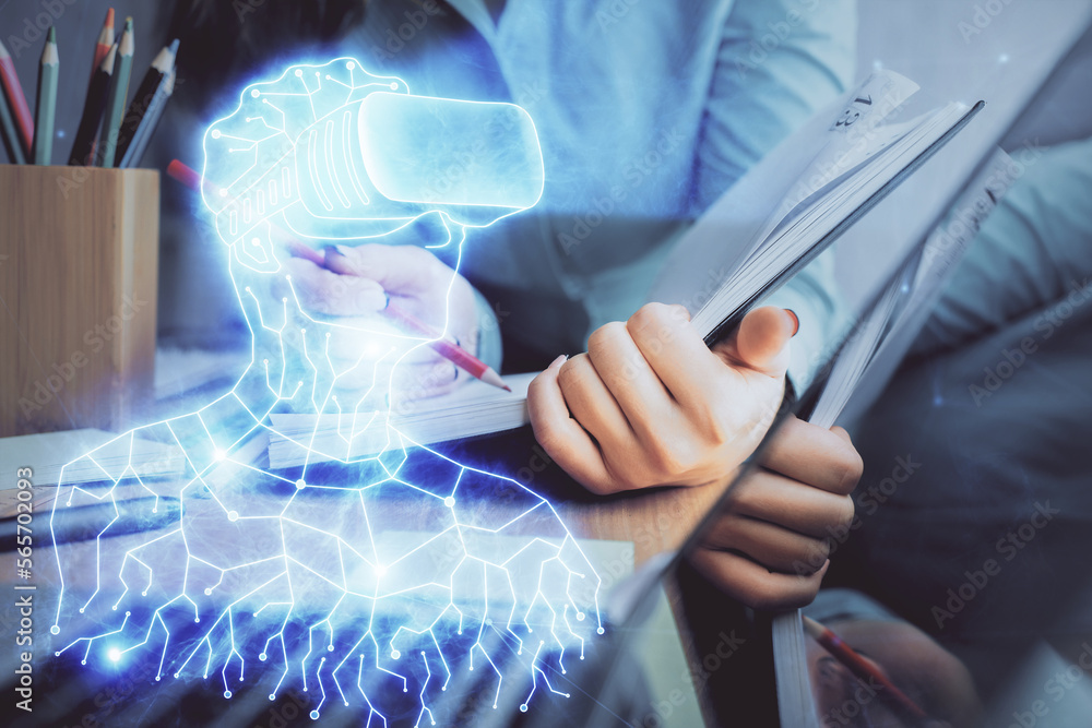 Poster ar hologram over hands taking notes background. concept of augmented reality. double exposure