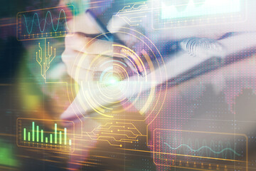 Fototapeta premium Double exposure of woman's hands on background with technology and digital coding icons. Data development concept. Close up.