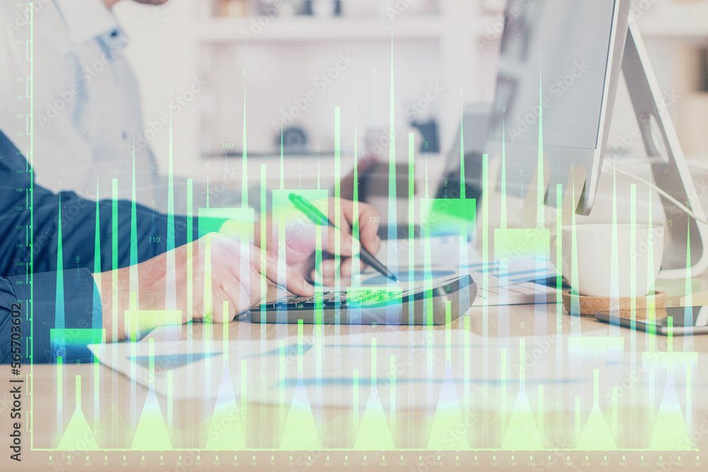 Poster forex graph with businessman working on computer in office on background. concept of hardworking. cl