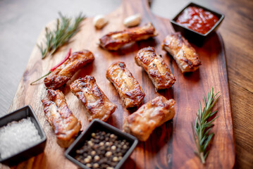 grilled pork ribs on wooden background 