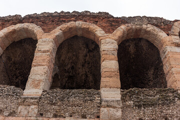 A panoramic view from below of Verona Arena, showcasing its iconic architectural design and grandeur