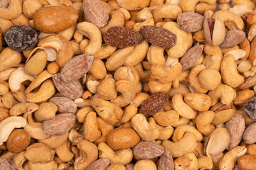 A group of almonds, pistachios, walnuts, macadamia, cashews.