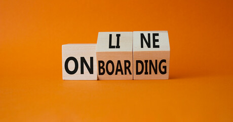 Online Onboarding symbol. Turned wooden cubes with words Online Onboarding. Beautiful orange background. Business and Online Onboarding concept. Copy space