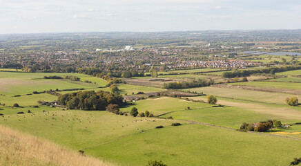 Fototapeta na wymiar Scenic Landscape View of Green Farmland Fields Seen From the Salisbury Plain in Wiltshire England