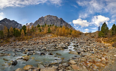 Russia. The South of Western Siberia, the Altai Mountains. Autumn view of the valley of the Aktru River, the source of which is located at the foot of the glacier on the North Chui mountain range.