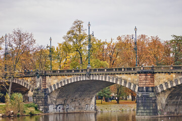 Fototapeta premium Stone old bridge above the Vltava river in Prague.