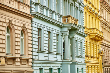 Colorful facades of historical buildings in Prague.