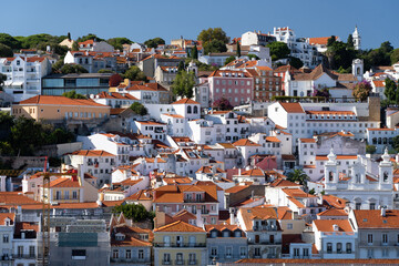 Obraz premium Lisbon, Portugal skyline of orange rooftops on the Tagus River. Vacation and travel concept