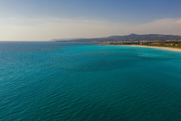Fototapeta na wymiar Drone photography of blue seaside and sandy beach