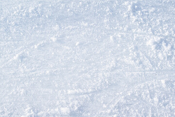 frosty blue ice pattern with lines from ice skates 