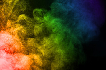 Obraz na płótnie Canvas Steam in rainbow colors against black background