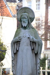  Statue of Standing Christ at the Begijnhof Courtyard in Amsterdam, Netherlands