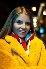 portrait of a girl against the background of a night city