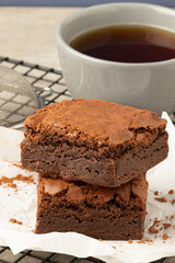Chocolate brownies with coffee. Selective focus.