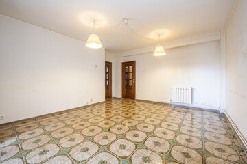 vintage living room with white pvc walls, striking stoneware floors, two sapele wood doors and...