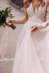 A large photo of a wedding bouquet in the hands of the bride 4369.