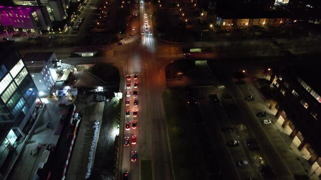 High Angle Footage of Central Milton Keynes City of England During Night. Illuminated City Centre Was Captured with Drone's Camera on 27th January 2023 after Sunset.