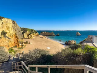 Foto op Plexiglas Marinha Beach, Algarve, Portugal Praia Dona Ana beach with turquoise sea water and cliffs, Portugal. Beautiful Dona Ana Beach (Praia Dona Ana) in Lagos, Algarve, Portugal..