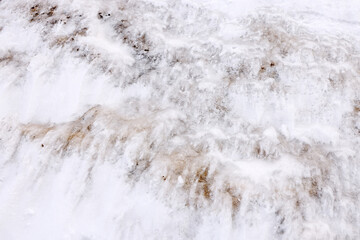 Ice frost on stone texture. Winter abstract background. Snow surface