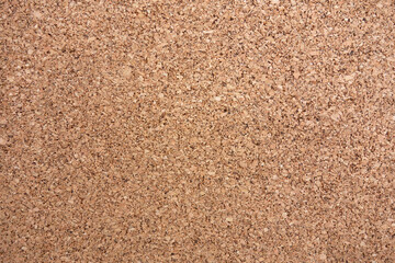 Photo of a cork background texture for attaching notes. A blackboard in the office.