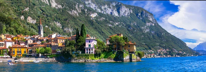 Fototapeten One of the most beautiful lakes of Italy - Lago di Como. panoramic view of beautiful Varenna village, popular tourist attraction © Freesurf