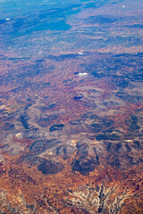 mountain landscape view from airplane window, vertical