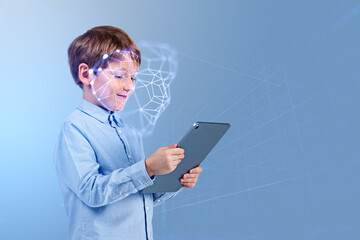 Kid boy working with tablet smiling and using facial scanner