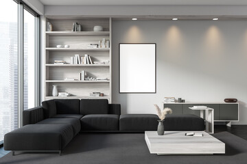 Dark living room interior with empty white poster